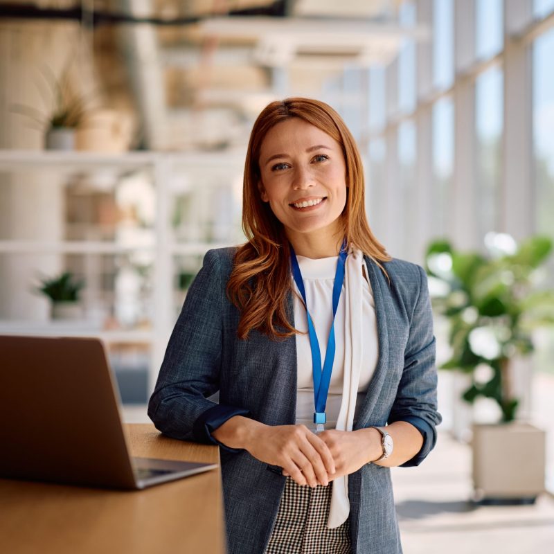 happy-female-manager-working-on-laptop-at-corporat-2026-01-08-08-11-38-utc-scaled-4-1